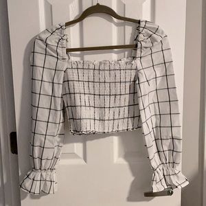 black and white cropped top with big shoulders